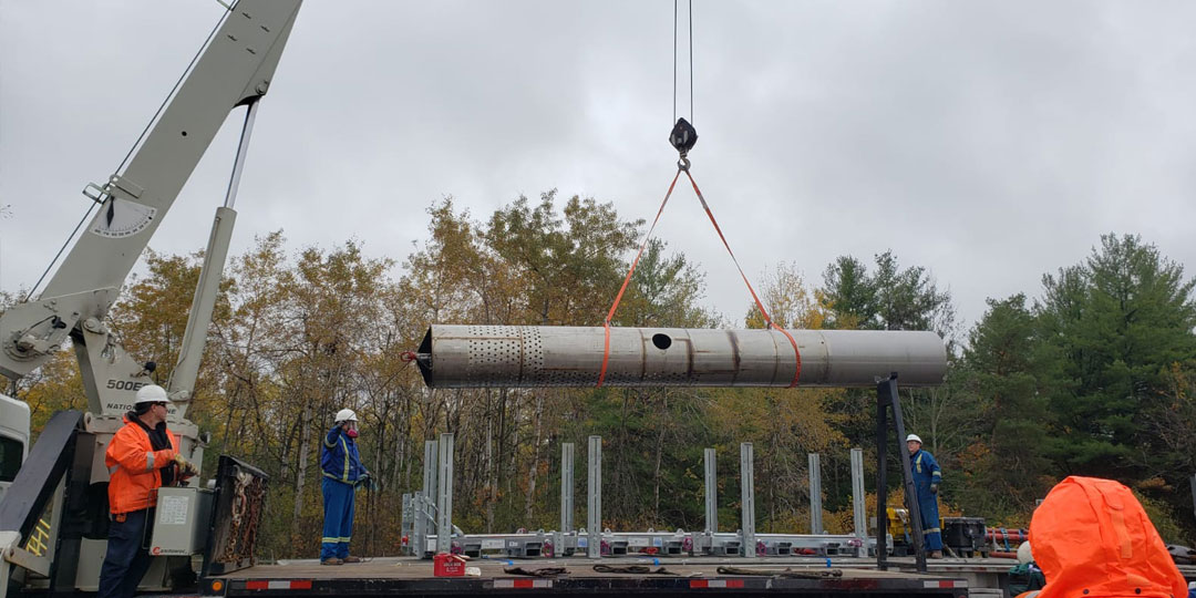 Lifting a pipe from truck